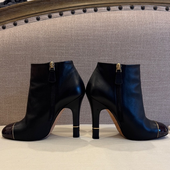 CHANEL Black Leather Heeled Boots with Gold Accents - Picture 5 of 7